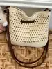 Bolso de Tejido Hueco Simple de Verano 2026 Transfronterizo para Mujer, Bolso Cruzado para Vacaciones en la Playa, Bolso de Hombro Versátil de Moda