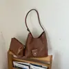 Bolsa de Palha Tecida Transfronteiriça Feminina 2026 Nova Casual Versátil Bolsa para o Dia a Dia Grande Capacidade Versátil Bolsa de Ombro Único para Sob o Braço