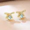 Novos brincos de zircônia de alta qualidade em formato de laço com jadeíta natural para mulheres, modernos, de luxo leve, com temperamento doce, brincos versáteis