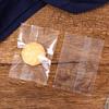 Bolsa de embalaje de turrón crujiente de copo de nieve directo de fábrica, bolsa sellada para máquina de pastel de botón transparente de leche y azufaifo rojo neto 100