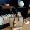 Bolsa Tote Grande Capacidade Feminina 2026 Nova Versátil Nicho Feminina de Viagem Ombro Único Sob o Braço