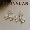 Nuevos Pendientes de Aro con Lazo Completamente Incrustados de Diamantes, Moda Europea y Americana Exquisita Personalizada, Lujo Ligero, Gama Alta, Pendientes Elegantes para un Look Moderno de Oficina