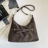 Textura retro gran capacidad 2026 color sólido temperamento invierno nuevo elegante casual bolso de mano bandolera mujer