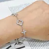 Pulsera de Trébol de Cuatro Hojas Hueca de Lujo Ligero, Pulsera de Moda y de Gama Alta, Pulsera de Circonita, Joyería de Mano para Mujeres, Estilo Nuevo