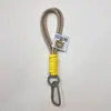 Lanyard para celular com combinação de cores, corda trançada de nylon, pingente de chaveiro, acessórios para pendurar em bolsa de boneca de pelúcia DIY