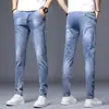Calças jeans masculinas, calças casuais esportivas masculinas, estilo coreano para primavera e outono, slim fit, marca moderna, calças skinny elásticas, calças compridas versáteis da moda