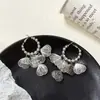 Brincos de Franja Pétala de Prata Hueca Agulha de Prata Argolas da Moda Pregos Luxo Leve High-End Novos Brincos Versáteis para Mulheres