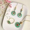 Atacado de fábrica 925 prata incrustada Dongling Jade estilo antigo pingente brincos anel conjunto de três peças Jade Jade transmissão ao vivo