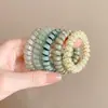 Ligas para el cabello tipo cable de teléfono coreano, Bandas de colores versátiles para el cabello, Bandas de goma duraderas de alta elasticidad, Dulces accesorios para el cabello estilo Ins para mujeres