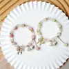 Pulsera de Flor de Lirio del Valle Súper Popular para Mujer Ins Trendy Mejor Amiga Estilo Antiguo Pulsera Dulce Estudiante Simple Versátil Joyería para Mano
