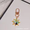Llavero Colgante Tarot Halloween Sol Luna Estrella Brújula Carta Colgante Colgante para Bolsa de Auriculares AirPods