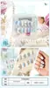 Estuche con juego de pegatinas para uñas para usar, diseños sencillos de dibujos animados con pedrería, varias pegatinas de uñas desmontables