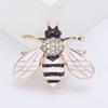 Lindo broche de abeja en miniatura de estilo europeo y americano con esmalte que gotea, joyería que combina con todo, broche de insecto de aleación de comercio exterior con diamantes de imitación