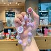 Nuevo colgante de cadena para teléfono móvil con forma de rosa y aceite de gota, con cuentas de calabaza, para cámara, llavero, bolso y teléfono móvil.