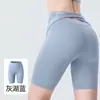 Novos shorts de yoga femininos de alta elasticidade com sensação de pele nua, cintura alta, levantamento de bumbum pêssego, shorts apertados para fitness transfronteiriços, calças de ciclismo