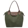 2026 Bolso Nuevo de Gran Capacidad Estilo Fresco Bolso de Nylon Versátil de Moda para Mujer Versátil para Viajes Cotidianos Bolso de Hombro Único