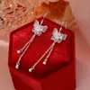 Aretes de Plata con Forma de Pie y Lazo para Mujer 2024 Nuevos Populares Ganchos para Oreja Tachuelas de Oreja Lujo Ligero Nicho Pendientes de Gama Alta Verano