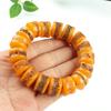 Pulsera de Cera de Abeja Ámbar de Segunda Generación Venta al por Mayor de Fábrica Ámbar Sangre Ámbar Flor Ámbar Medicina Pulsera de Cera Vieja Fluorescente Flotante Agua Salada