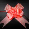Suministros para bodas al por mayor, flores tiradas a mano con el carácter de doble felicidad del dragón rojo y el fénix, tamaño de 5 cm, decoraciones para coche de bodas, flores para tirar de la puerta del coche.