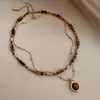 Elegante Collar Colgante de Piedra Ojo de Tigre con Perlas de Doble Capa para Otoño/Invierno Estilo Vintage Cadena para Suéter de Celebridad de Internet