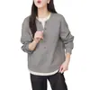 Moletom Falso de Duas Peças com Blocos de Cor Simples para Mulheres, Novo Modelo Outono/Inverno 2026, Gola Redonda, Manga Longa, Moda Casual Versátil, Top que Reduz a Idade