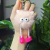 Explosiones de red creativa felpa piernas largas colgante bolita de carbón pequeño oreja de elfo bola de pelo llavero colgante de bolso regalo mayoreo