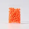 Bolsa de 100 granos de cera para lacrar al fuego, bolsa de granos de cera, color mixto, directo de fábrica para estudiantes, sobre retro, cera, juguetes creativos, venta al por mayor