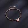Nuevo tobillera de titanio color oro rosa para mujer, creativa, doble mariposa esmerilada, tobillera con cuentas redondas, joyería simple para el pie, venta al por mayor