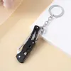 Cuchillo de fruta de acero inoxidable para camping al aire libre transfronterizo, cuchillo plegable EDC portátil para llevar en cabina, llavero, color