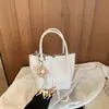 Bolso tejido de alta gama transfronterizo para mujer, nuevo y popular bolso versátil para hombro y bandolera 2026, bolso tipo cubo madre e hijo