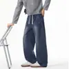 Calça reta e curva nova de Tencel Lyocell para outono e inverno para homens, versátil, jovial, moderna, perna larga, modeladora, calça casual solta