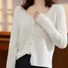 Nuevo top de punto de núcleo para otoño e invierno, cárdigan fino de lana, chaqueta tejida para mujer, suéter corto de punto abierto de cintura alta