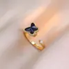 Anel Transfronteiriço para Mulheres, Flores Micro-Incrustadas, Zircônia Giratória, Estilo Moderno e Descolado, Anel de Amor com Diamantes Completos Atacado de Joias