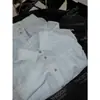 Recomendación PrincipalCamisa Larga de Manga Larga Oversize Yuran 26 Estilo Nuevo de Principios de Primavera Bloque de Color Lino Botón de Hongo Diseño de Doble Bolsillo