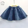 Saia Curta para Meninas 2018 Roupas Infantis para Meninas Saia Jeans Lavada Mais Fácil de Combinar Saia Jeans Curta com Rebites Substituta de Peça Única