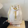 Bolso de hombro retro de gran capacidad transfronterizo para mujer, nuevo bolso cubo casual simple de verano 2026, bolso bandolera para debajo del brazo