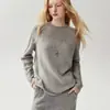 Suéter de cachemira nuevo, de corte relajado, cuello redondo y manga raglán para mujer, un suéter de lana versátil perfecto para usar en capas en otoño e invierno.