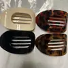 Nuevo Clip de Tiburón Curvo Elegante de Disco Plano Ovalado Nuevo para el Cabello Trasero Pinza para el Cabello con Diseño de Arco