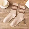 Meias felpudas femininas outono cor sólida ins da moda outono e inverno meias Coreia do Sul primavera e outono estilo coreano estilo preppy meias listradas de cano médio