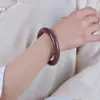 Venta al por mayor de fábrica Pulsera de jade fino Oro Jade para mujer pulsera de jade redonda gruesa anillo positivo rosa carne pulsera de jade para niña