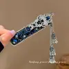 Novo Grampo de Cabelo com Sino Azul de Obsidiana Brilhante e Franja de Diamante Estilo Chinês para Mulheres, Novo Acessório de Cabelo de Clipe Lateral para Franja Estilo Étnico de Alta Qualidade