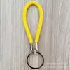 Llavero de cuerda de cuero trenzado simple creativo colgante de muñeca linda accesorios de llave para parejas tendencia regalos pequeños venta al por mayor