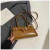 2025 Nueva Bolsa Retro Bajo el Brazo Moda Casual Versión Coreana Bolsa Baguette de Nicho Bolso de Hombro Simple para el Trabajo de Mujer