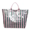 Bolso tote para mujer, bolso de playa transfronterizo, bolso con estampado de letras, bolso transparente minimalista de DuPont, bolso de mano, bolso grande de capacidad para el trabajo