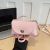 Mini Bolsa de Ombro de Couro Feminina 2026 Nova Bolsa Transversal Simples Bolsa Pequena Cor Sólida Bolsa de Mão Versátil Bolsa de Axila