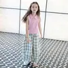 Conjunto de Verano para Niñas 2026 Nuevo Casual Estilo Coreano para Niñas Mayores Camisa Polo Chaleco Combinado con Pantalones a Cuadros Moderno