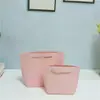 Saco de presente de papel Yuanbao Saco de presente com fita Saco de compras para roupas com placa de luz Saco de presente com corda de três fios logo impresso