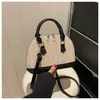Moda Primavera 2026 Grande Capacidade Texturizada Cor Color Block Tendência Atmosférico Tecido Popular Ombro Único Transversal Portátil Bolsa Concha