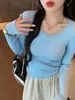 Suéter gris de cuello redondo bajo para mujer, capa base, ropa interior, nuevo estilo otoño e invierno, top de punto de manga larga ajustado