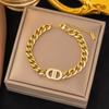 Pulsera de acero inoxidable de alta gama para nicho de venta caliente transfronteriza que no se desvanece, pulsera de trébol de cuerda roja perla para niña, joyería